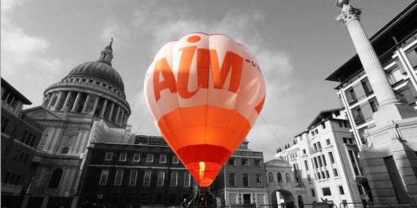 AIM hot air balloon floating past London Stock Exchange 