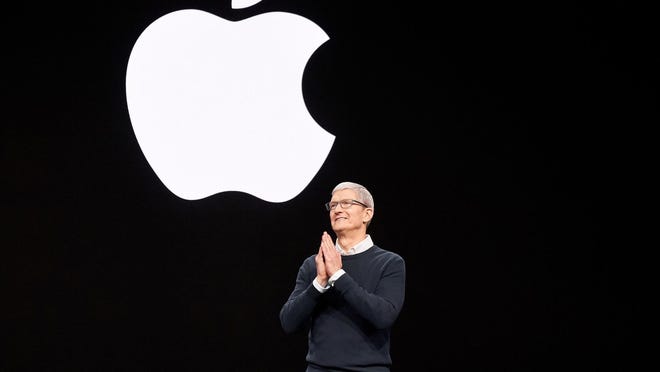 Tim Cook chief executive of Apple making announcement 