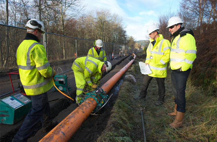 Fulcrum workers attending a gas pipe