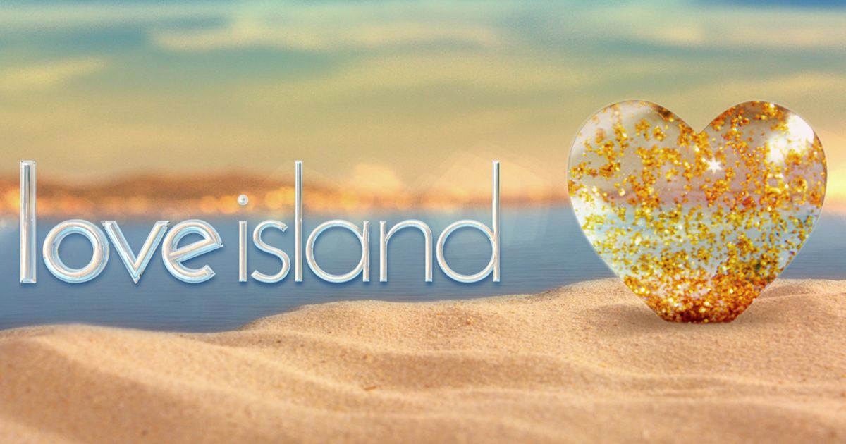 Love Island logo on beach with golden heart