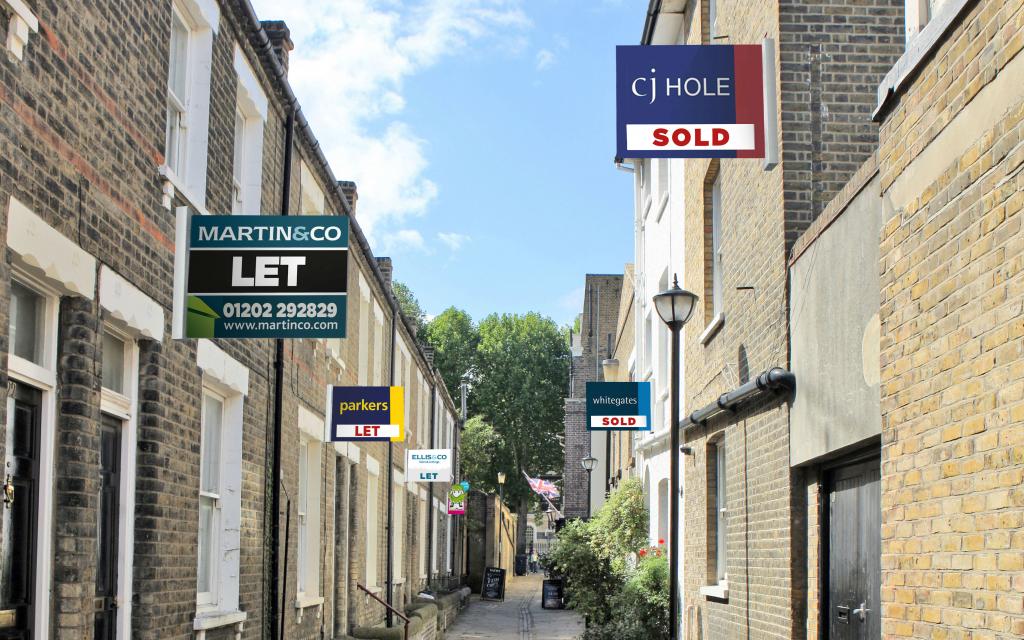 To let and sold boards in a road