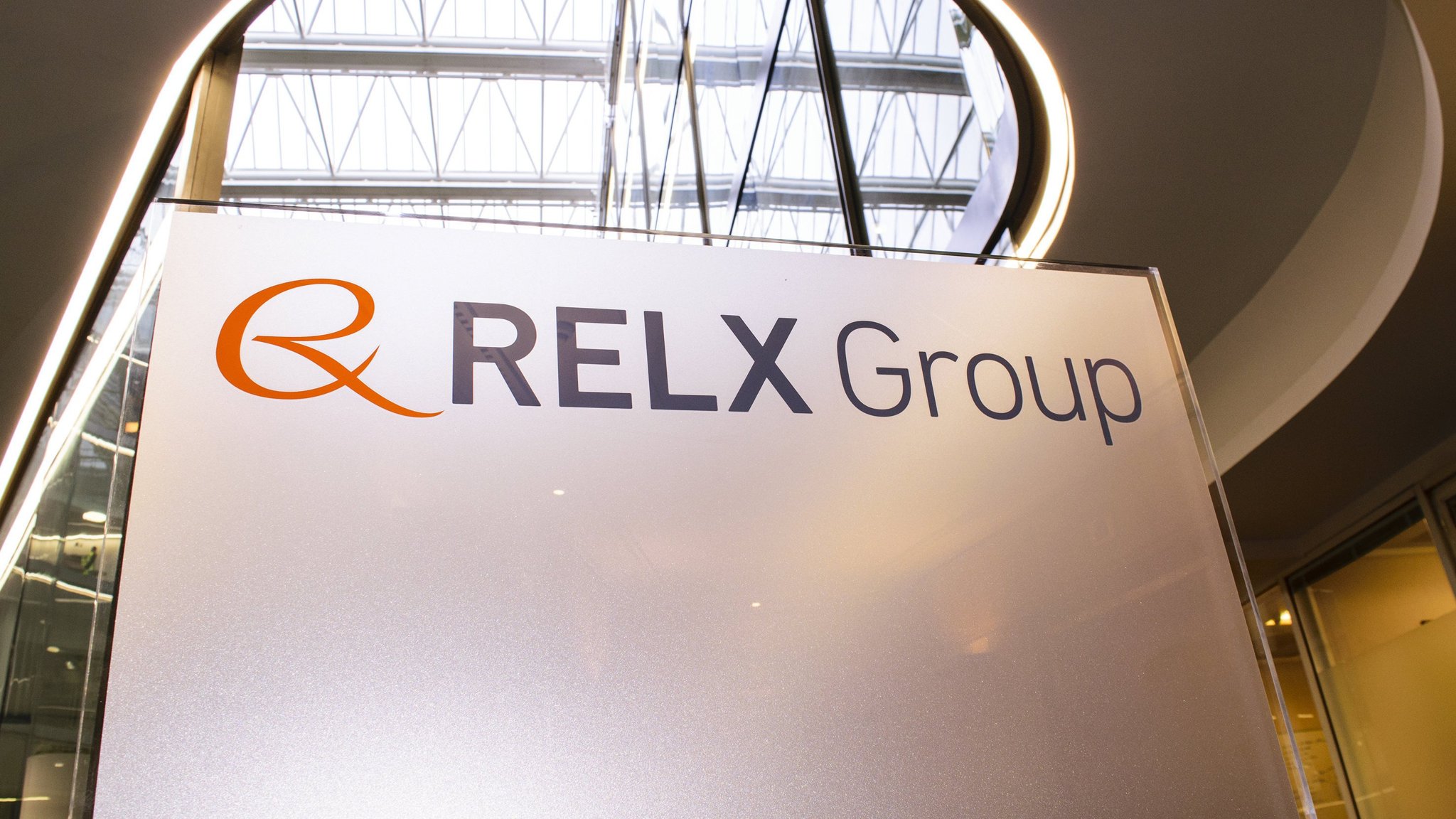 Relx logo and branding on a banner in a building